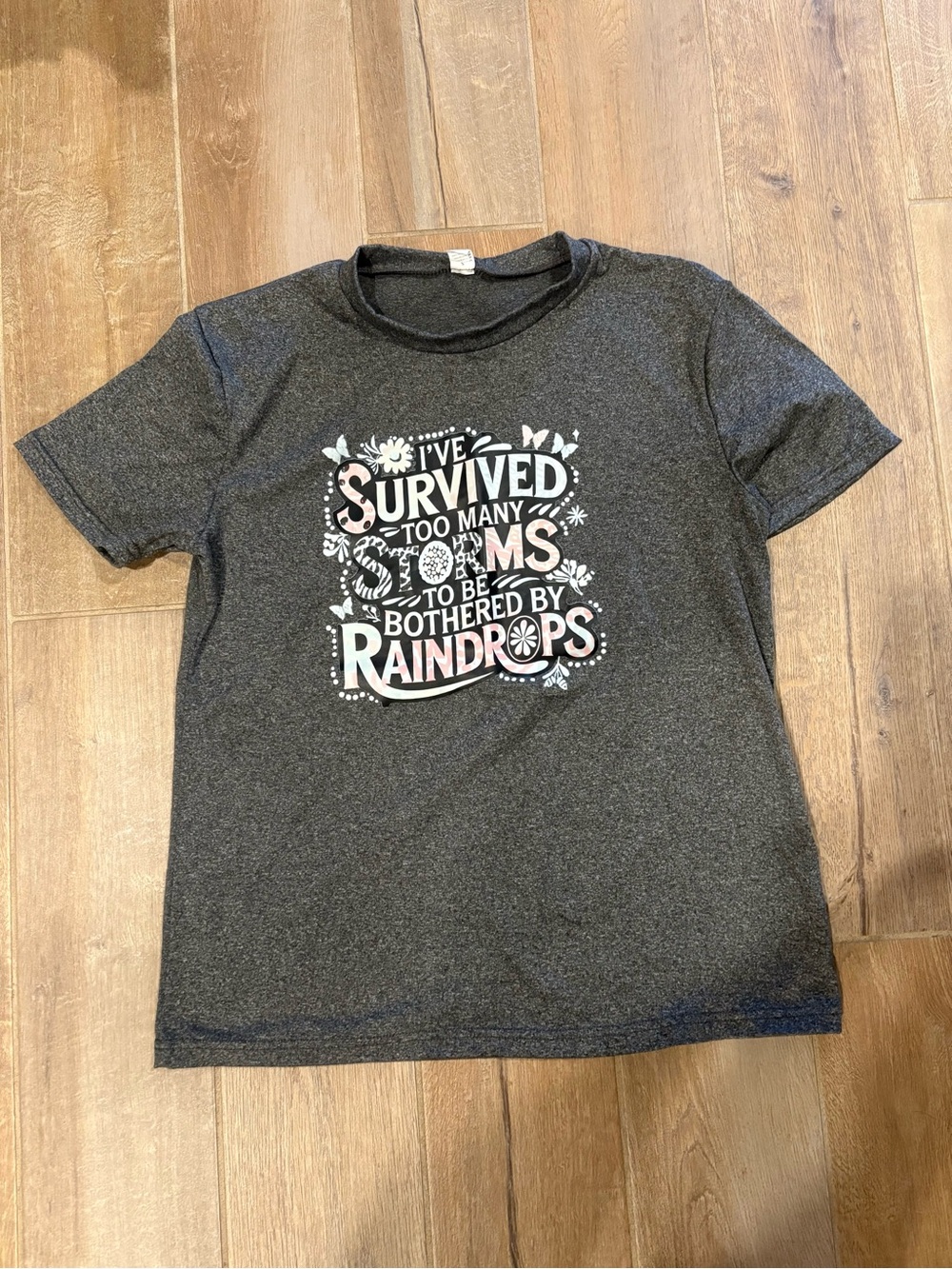 NWOT-Women Graphic Tee - Charcoal "I've Survived Too Many Storms"
